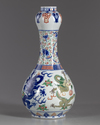 A Chinese wucai glazed 'dragons' garlic-head vase