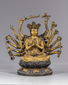 A MULTI-ARMED GILT CHINESE BRONZE FIGURE OF GUANYIN