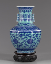 A Chinese gasoline green ground blue and white vase