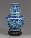 A Chinese gasoline green ground blue and white vase