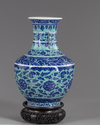 A Chinese gasoline green ground blue and white vase
