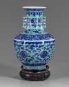 A Chinese gasoline green ground blue and white vase