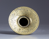 An Islamic brass pot