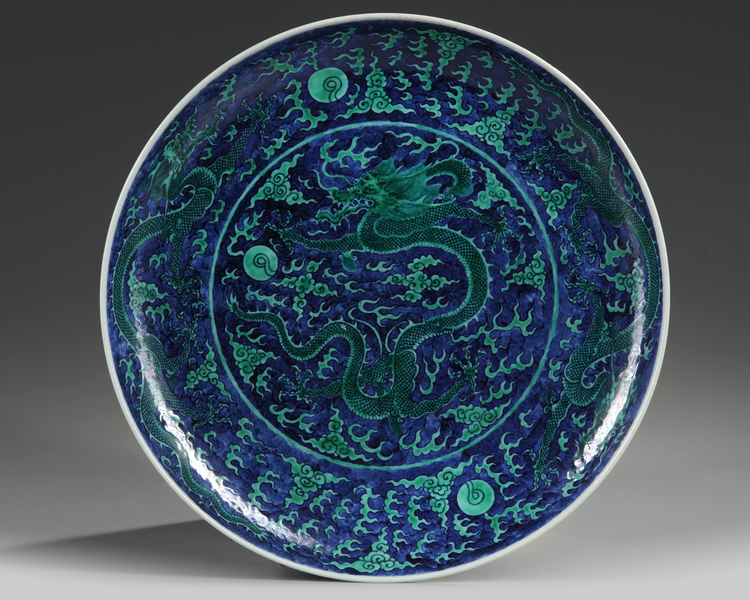 A Chinese blue ground green-enamelled 'dragon' charger