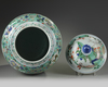 A large Chinese famille verte baluster vase and a wucai cover
