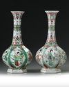 A pair of Chinese famille verte hexagonal bottle vases