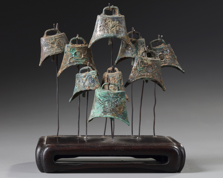A set of nine Chinese bronze carriage bells