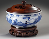 A Chinese blue and white 'Eight Immortals' tripod censer