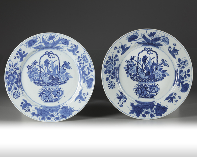 A pair of Chinese blue and white 'flower basket' dishes