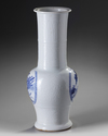 A CHINESE MOULDED WHITE-GROUND BLUE AND WHITE PHOENIX-TAIL VASE, KANGXI PERIOD (1662-1722)