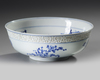 A CHINESE BLUE AND WHITE 'FLOWERS OF THE FOUR SEAONS' BOWL