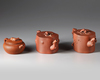 Three Chinese Yixing teapots and covers
