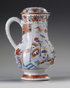A Chinese famille rose jug and cover