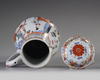A Chinese famille rose jug and cover