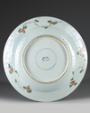 A CHINESE POWDER BLUE-GROUND FAMILLE VERTE CHARGER