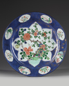 A CHINESE POWDER BLUE-GROUND FAMILLE VERTE CHARGER