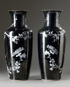 A pair of Chinese black-ground enamelled 'magpie and prunus' vases