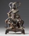 A Chinese gilt lacquered bronze figure of Guandi
