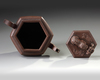 A Chinese Yixing hexagonal teapot and cover