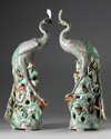A pair of Chinese famille rose peacocks