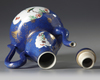 A Chinese powder blue-ground famille verte ewer and cover