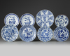A group of eight Chinese blue and white dishes