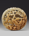 A Chinese white and russet  jade 'birds' openwork carving