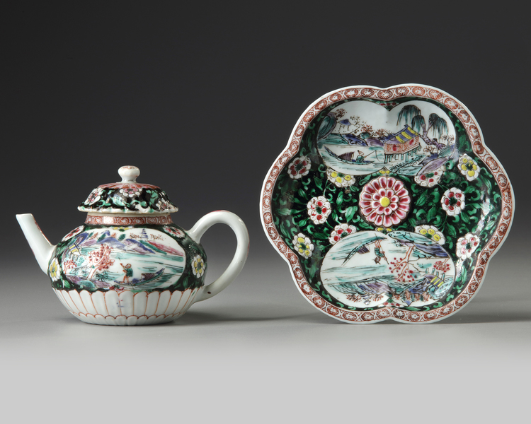 A CHINESE BLACK-GROUND FAMILLE ROSE TEAPOT, COVER AND STAND, YONGZHENG PERIOD (1723-1735)