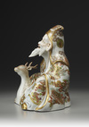 A JAPANESE SATSUMA FIGURE OF SEATED JUROJIN AND A DEER, MEIJI PERIOD (1868-1926)