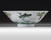 A CHINESE FAMILLE VERTE 'CRANE AND PEACH' BOWL