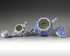 Two Chinese blue and white teapots and covers
