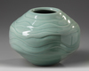 A modern Japanese celadon ceramic vase in a box