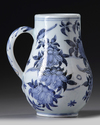 A JAPANESE ARITA BLUE AND WHITE JUG, 17TH CENTURY