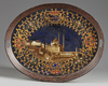 An Islamic painted metal oval shaped tray
