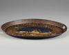 An Islamic painted metal oval shaped tray