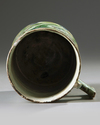 An Ottoman Iznik pottery tankard