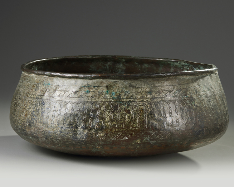 A Persian bronze bowl