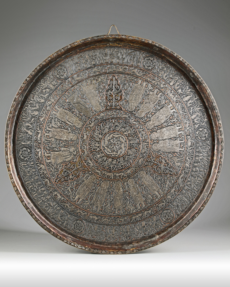 A HEAVY ISLAMIC SILVER INLAID CIRCULAR BRONZE AND COPPER TRAY