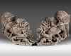 A rare set of two plain wooden corbels from Kyūshū with carved Chinese lions (karashishi)