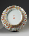 A Chinese famille rose 'bats and clouds' bottle vase