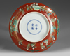 A Chinese coral-ground famille verte 'boys' dish