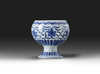 A Chinese blue and white stem bowl