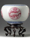 A pair of Chinese famille rose 'dragon' jardinieres