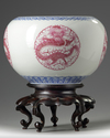 A pair of Chinese famille rose 'dragon' jardinieres