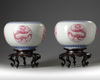 A pair of Chinese famille rose 'dragon' jardinieres