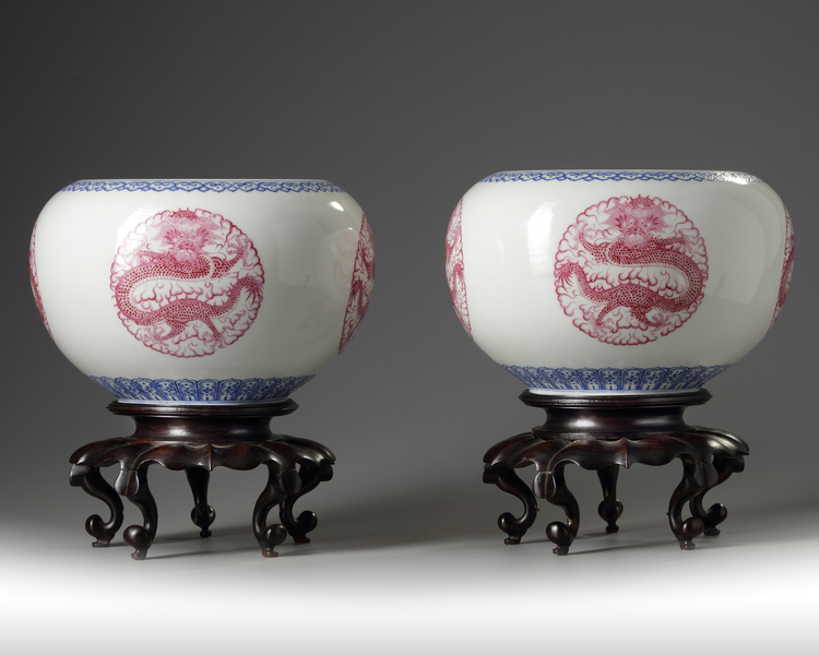 A pair of Chinese famille rose 'dragon' jardinieres