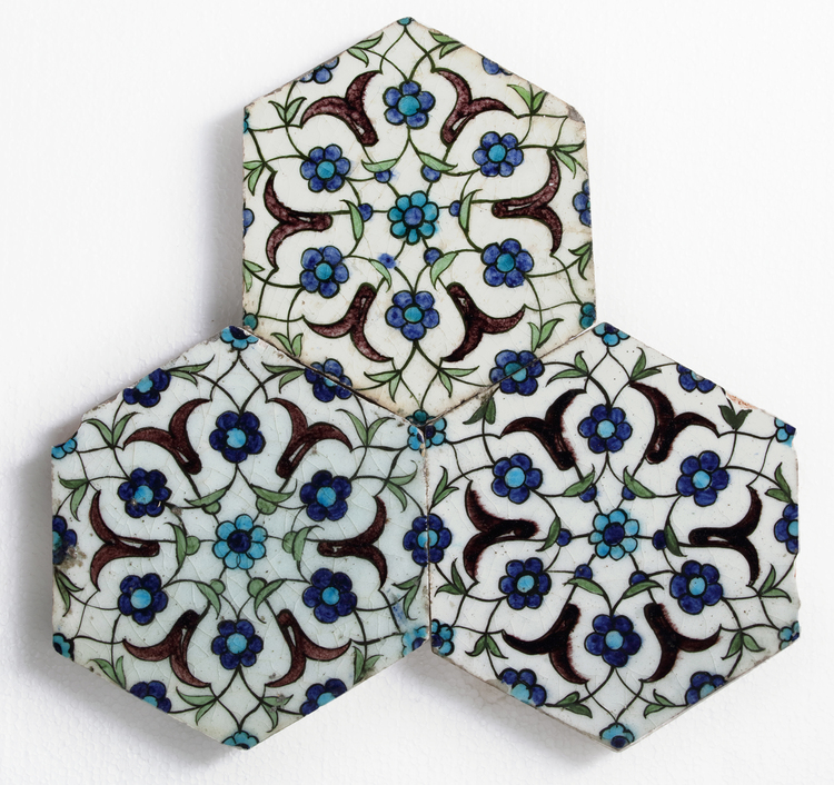 Three Ottoman hexagonal Iznik tiles