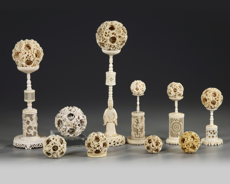 A GROUP OF CANTONESE CARVED IVORY PUZZLE BALLS AND STANDS, CHINA, 19TH CENTURY