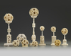 A GROUP OF CANTONESE CARVED IVORY PUZZLE BALLS AND STANDS, CHINA, 19TH CENTURY