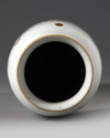 A Chinese wucai sleeve vase